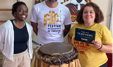 Teachers Julie Ann Robinson and Lisandra Rosario Learn Capoeira drumming in Brazil